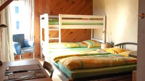 Postel nebo postele na pokoji v ubytování BnB Solarhaus