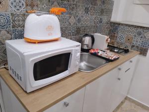 Kuchyň nebo kuchyňský kout v ubytování Holiday House Annunziata 1