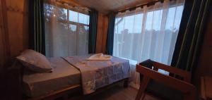 Giường trong phòng chung tại Lushoto Coffee Lodge
