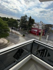 a view of a parking lot from a balcony at MonoambienteXdia in Villa Dolores