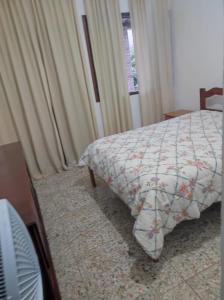 Postel nebo postele na pokoji v ubytování Casa Aconchegante + 13 fotografií