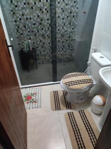 Et badeværelse på Casa Aconchegante + 30 billeder