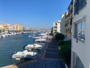 a group of boats are docked in a marina at Appartement spacieux 6 couchages in Cap d'Agde
