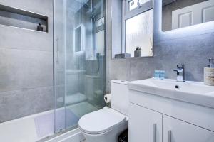 Et badeværelse på The Parklane Residence + 15 billeder