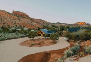 an aerial view of a house in the desert at Casa Vermillion Modern Kanab Family Cabin Red Rock Views Near Zion in Kanab