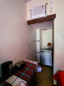 Η κουζίνα ή μικρή κουζίνα στο Aparthotel Praia do Pero