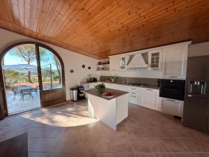 Η κουζίνα ή μικρή κουζίνα στο Casale delle Luci