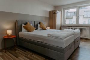 Ένα ή περισσότερα κρεβάτια σε δωμάτιο στο Stilvoll in Frankfurt Höchst - Feeling at home