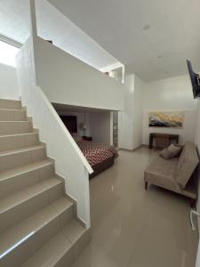 Posezení v ubytování La casa de las palmeras + 26 fotografií