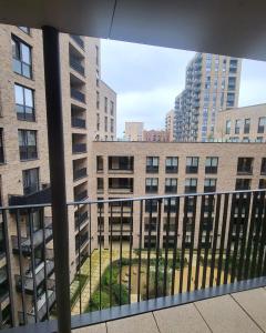 a view from the balcony of a building at Next to Southall Station - Brand new Apartment Room in Southall