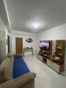 Televisyen dan/atau pusat hiburan di Casa com piscina