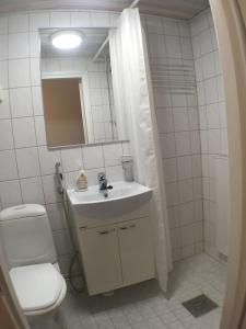 Kylpyhuone majoituspaikassa City Apartment Sairaalakatu