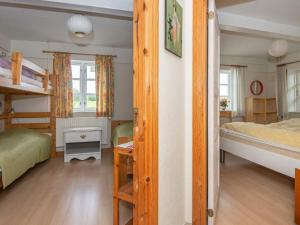 Ένα ή περισσότερα κρεβάτια σε δωμάτιο στο 5 person holiday home in Højer-By Traum