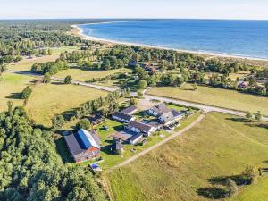 an aerial view of a house next to the beach at 4 person holiday home in LÖTTORP-By Traum in Löttorp