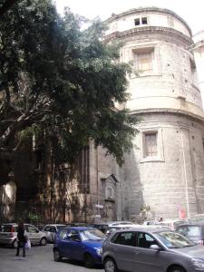 an old building with cars parked in front of it at meli20home in Palermo