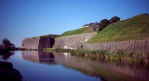 a view of a river between two large walls at Home Hotel Fregatten in Varberg +52 photos