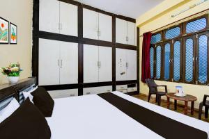 Ένα ή περισσότερα κρεβάτια σε δωμάτιο στο Hotel O Gracious Inn +21 φωτογραφίες