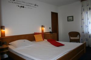 Postel nebo postele na pokoji v ubytování City Hotel Hanau