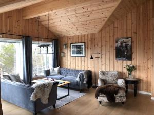 Posezení v ubytování 12 person holiday home in Skare-By Traum