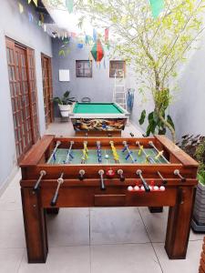 a pool table in a room with a pool table at Chácara Bela Vista Mairiporã in Mairiporã