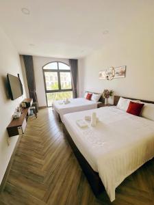 Postel nebo postele na pokoji v ubytování Me cong -HOMESTAY