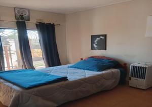 Postel nebo postele na pokoji v ubytování Nomad's Nest + 1 fotografie