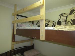 Postel nebo postele na pokoji v ubytování Santa lodge