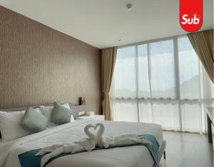 Ένα ή περισσότερα κρεβάτια σε δωμάτιο στο Modern Cozy Room in Hat Yai