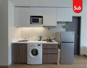 Η κουζίνα ή μικρή κουζίνα στο Modern Cozy Room in Hat Yai +10 φωτογραφίες