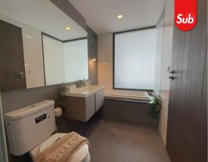 Ένα μπάνιο στο Modern Cozy Room in Hat Yai