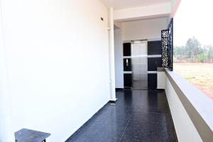 Afbeelding uit fotogalerij van The REEF LOUNGE in Mandya