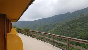 a view of a mountain from a train balcony at La Vallata in Rovieto