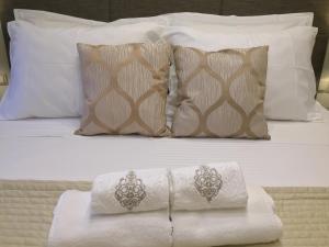Cama o camas de una habitación en Top View Residence