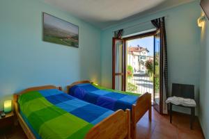 Postel nebo postele na pokoji v ubytování The Green Guest House + 37 fotografií