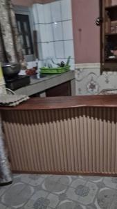 a kitchen with a sink and a counter top at Complexe la samaritaine in Yaoundé
