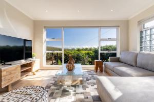 Μια τηλεόραση ή/και κέντρο ψυχαγωγίας στο Scarborough Family Beach House