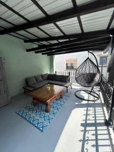 a living room with a couch and a chair at Excellent house in Ediger-Eller