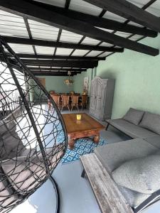 a living room with a couch and a table at Excellent house in Ediger-Eller