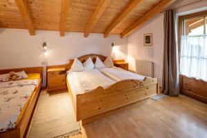 Postel nebo postele na pokoji v ubytování Haus Schönblick - wunderbare Zentrumslage