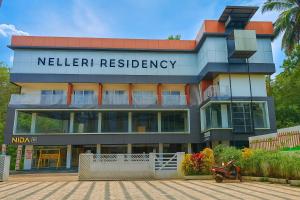 a building with a sign that reads keller residency at Nelleri Residency ROOMS STARTING AT 999 in Iritti
