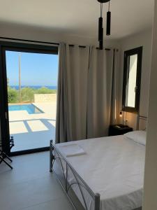 Ένα ή περισσότερα κρεβάτια σε δωμάτιο στο Profil villas +32 φωτογραφίες