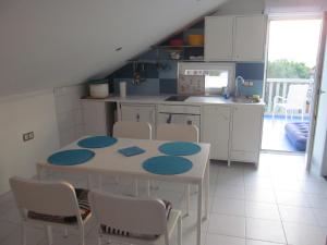Kuchyň nebo kuchyňský kout v ubytování Apartman Pašman K.B.168