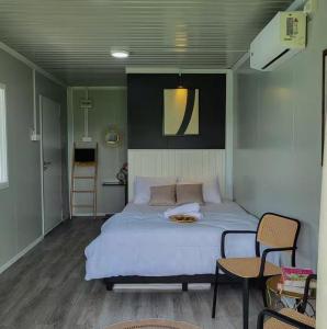 Ένα ή περισσότερα κρεβάτια σε δωμάτιο στο The kotak Cabinstay Parit Buntar