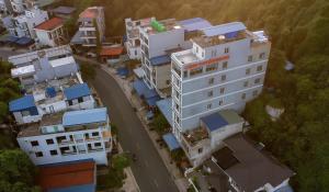 an overhead view of a city with buildings at Cảnh Tuyền Hotel View Lan Ha Bay in Cat Ba +5 photos