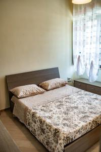 Postel nebo postele na pokoji v ubytování Casa Di Amelia