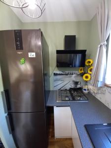 Η κουζίνα ή μικρή κουζίνα στο Wakacyjne mieszkanko