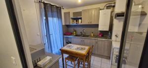 Η κουζίνα ή μικρή κουζίνα στο Appartement Duplex