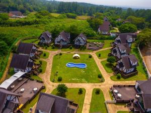 an aerial view of a house with a yard at Jeju Mungmung Place Dog Pension in Jeju