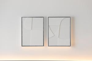 two empty windows in a white wall at Hotel Adonis Pelinor in Santa Cruz de Tenerife