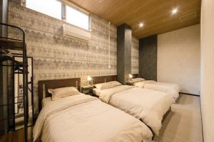Katil atau katil-katil dalam bilik di MORIHIRO Building